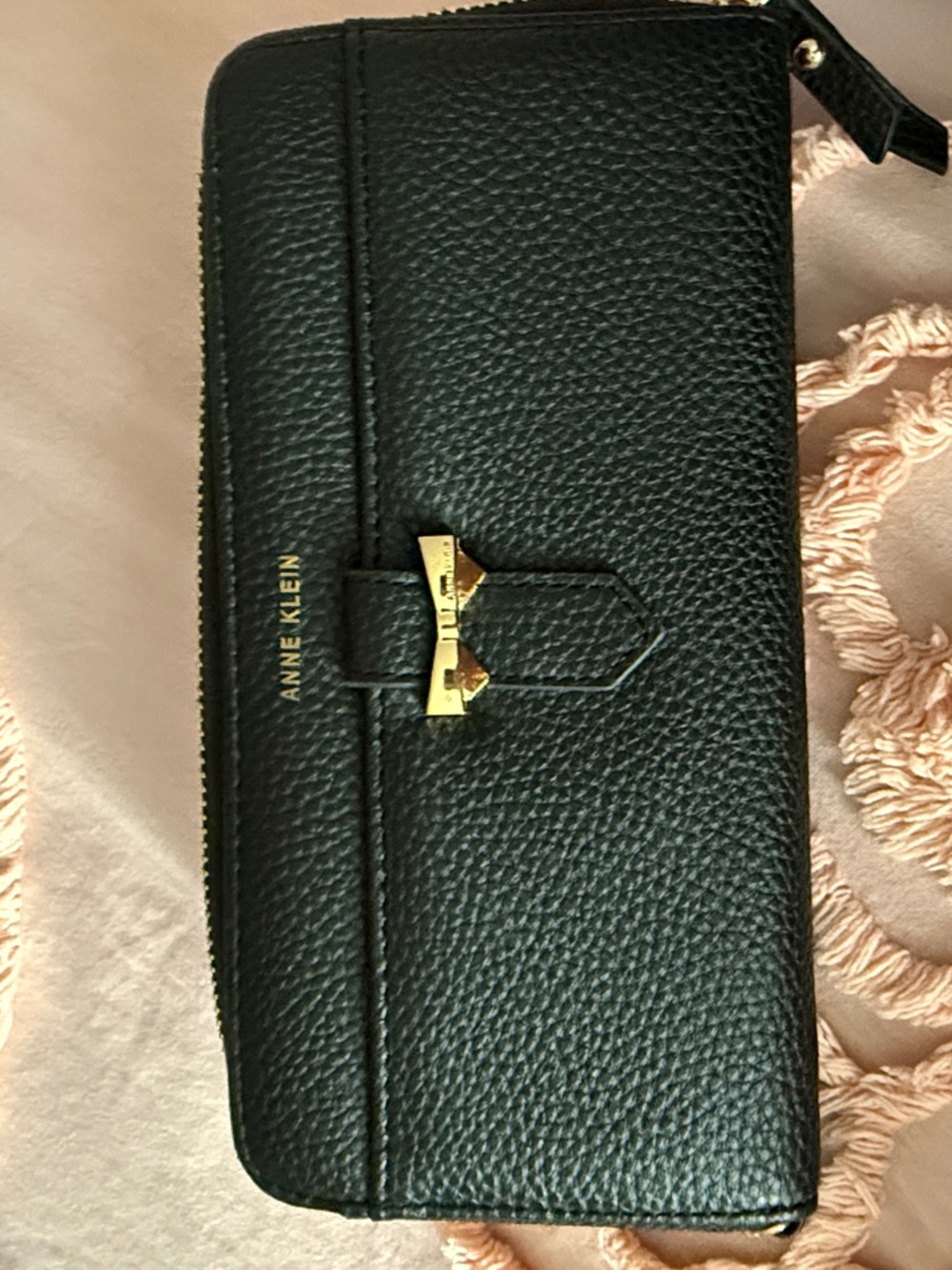 Anne Klein Black Pebbled Zip-Around Wallet with Gold Bow Accent
